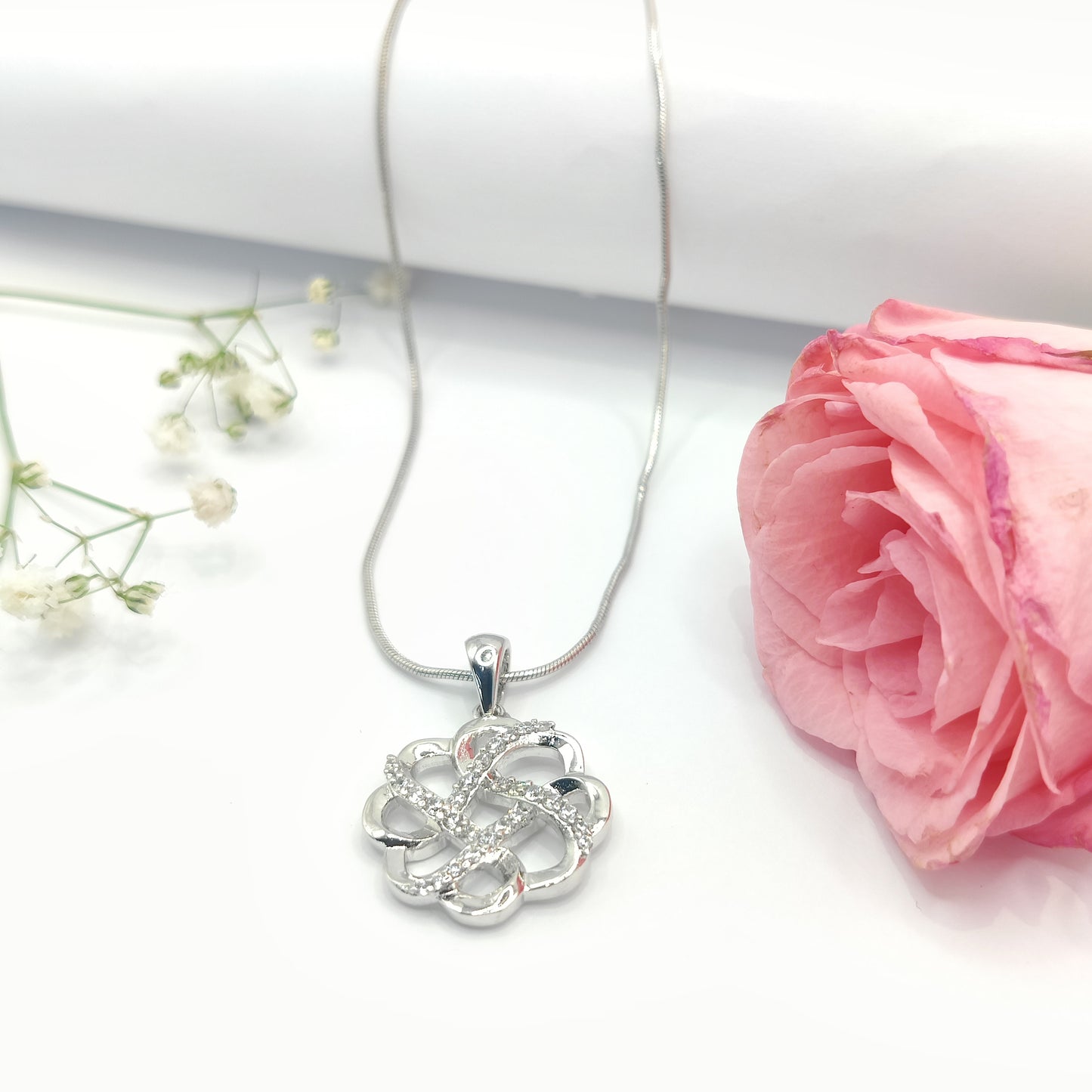 Sparkling Clover Knot CZ Silver Pendant