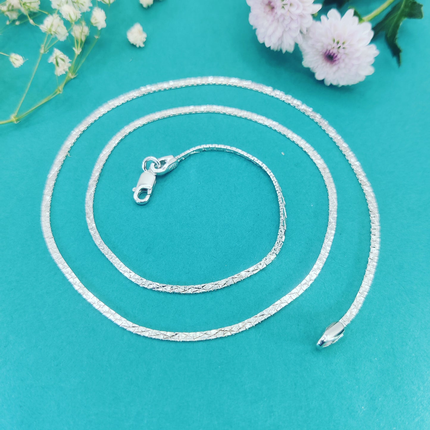Radiant Twist Silver Chain