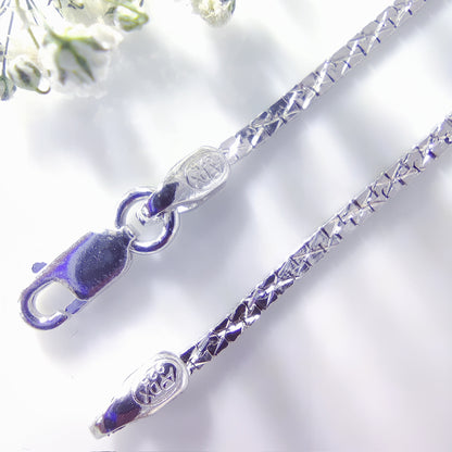 Radiant Twist Silver Chain